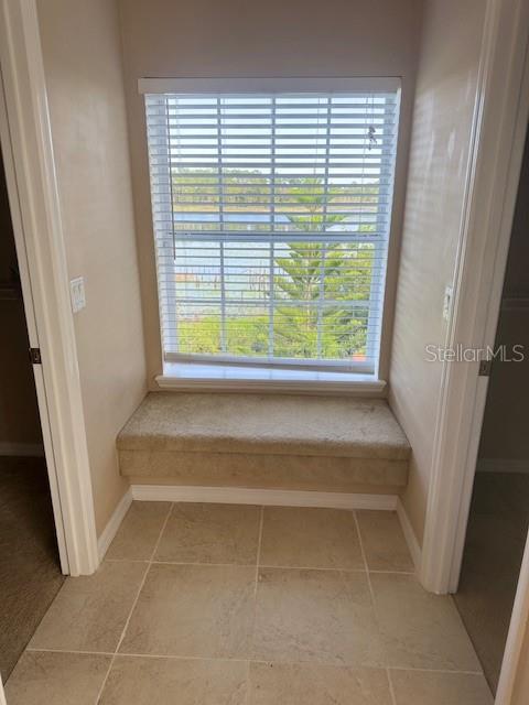 386 Haversham Road Deltona, FL 32725 - Photo 11 of 39 a view of an empty room with a window