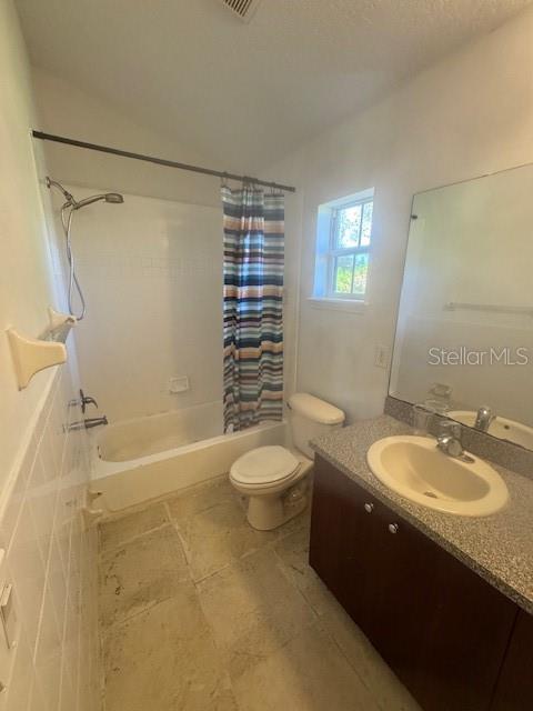 386 Haversham Road Deltona, FL 32725 - Photo 19 of 39 a bathroom with a sink a toilet and shower
