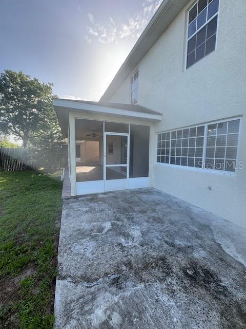 386 Haversham Road Deltona, FL 32725 - Photo 25 of 39 a view of a house with backyard and porch