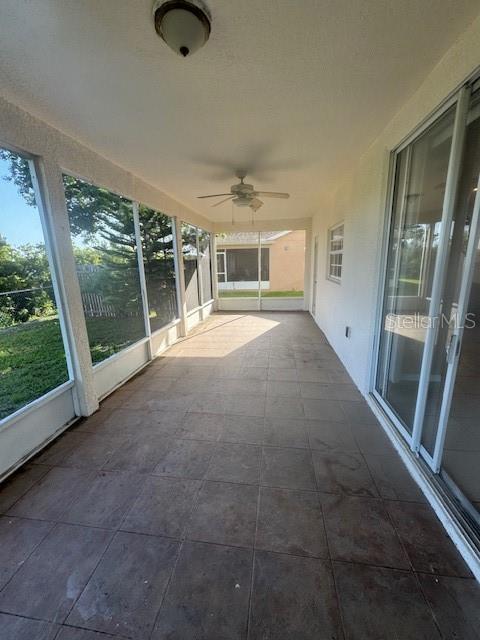 386 Haversham Road Deltona, FL 32725 - Photo 26 of 39 a view of an empty room with a window
