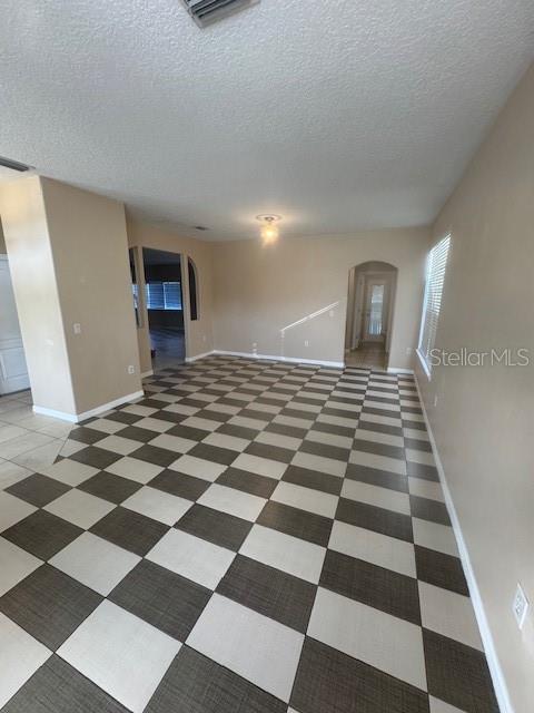 386 Haversham Road Deltona, FL 32725 - Photo 35 of 39 a view of a black and white checkered floor