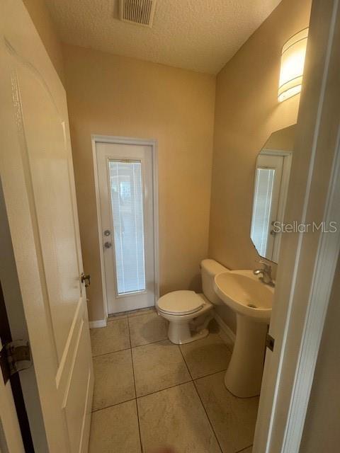 386 Haversham Road Deltona, FL 32725 - Photo 37 of 39 a bathroom with a sink and toilet