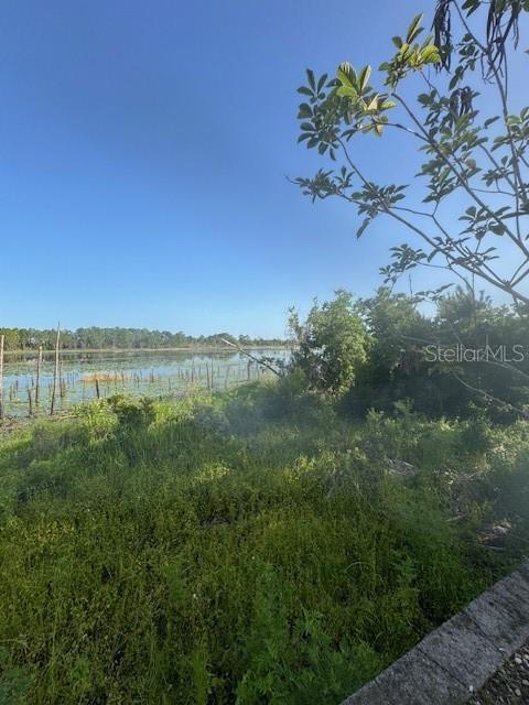 386 Haversham Road Deltona, FL 32725 - Photo 4 of 39 a view of lake with green space