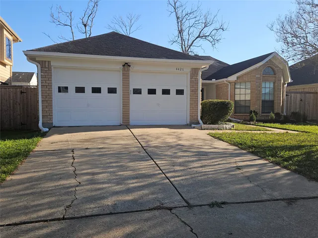 a front view of house with yard