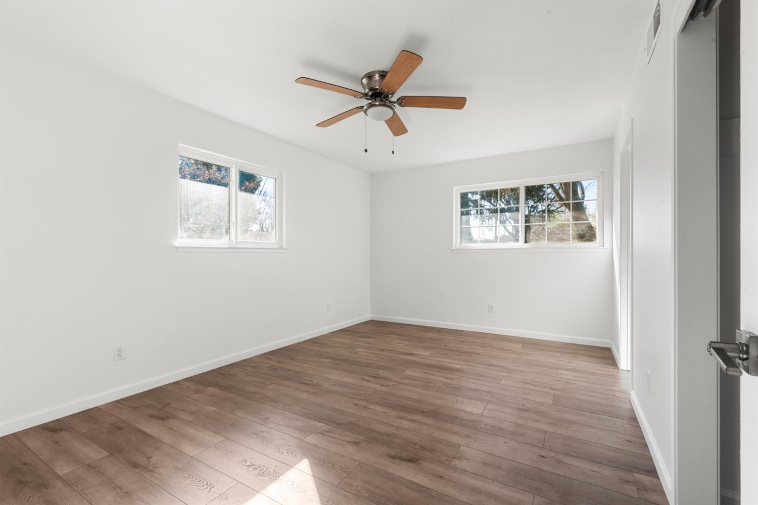 1713 Wolverine Way Modesto, CA 95355 - Photo 13 of 28 a view of an empty room with a window