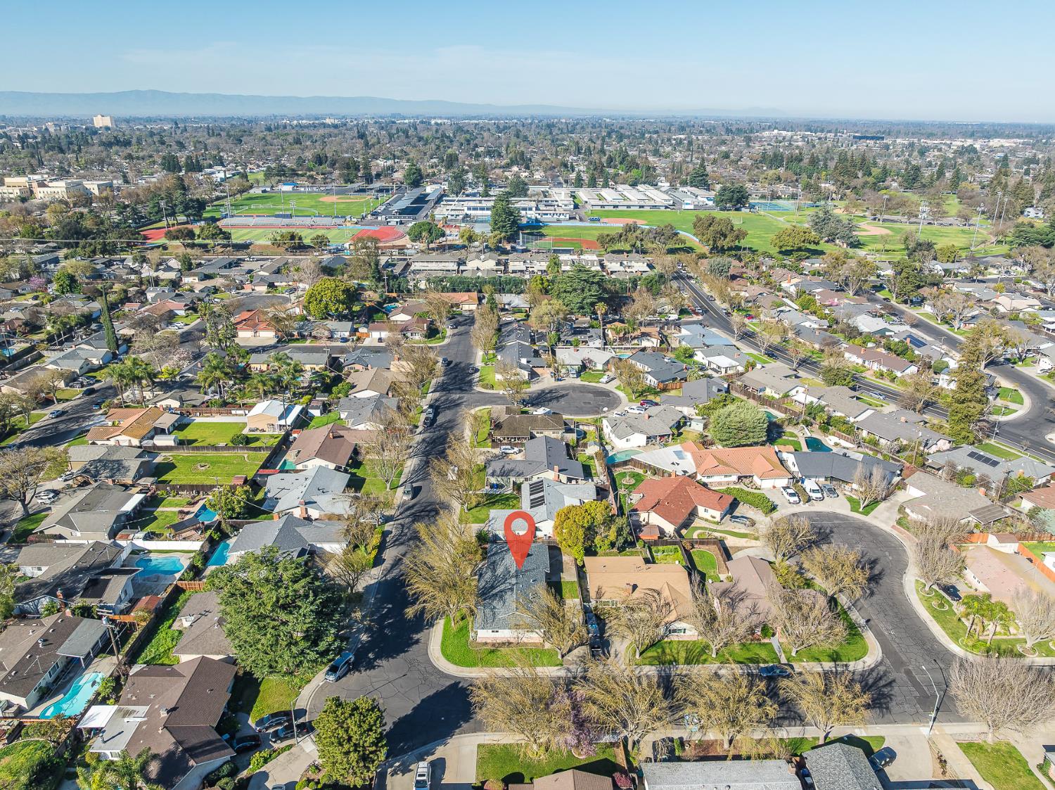 1713 Wolverine Way Modesto, CA 95355 - Photo 26 of 28 an aerial view of residential building and parking space