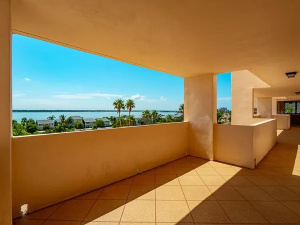 a view of yard with swimming pool and green space