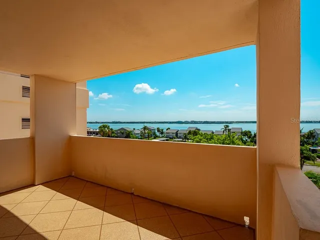 a view of swimming pool from a balcony