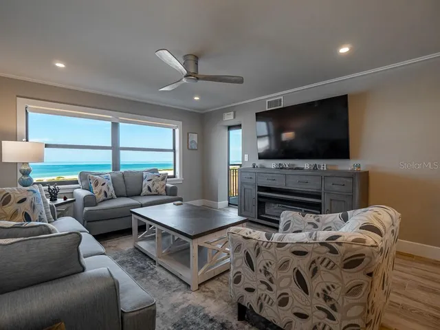 a room with a book shelf and a wooden floor