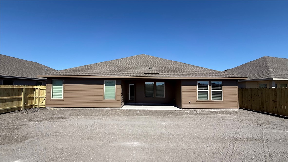 1409 Irigoyen Street Corpus Christi, TX 78415 - Photo 2 of 38 a front view of a house