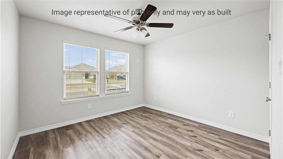 1409 Irigoyen Street Corpus Christi, TX 78415 - Photo 21 of 38 a view of empty room with wooden floor