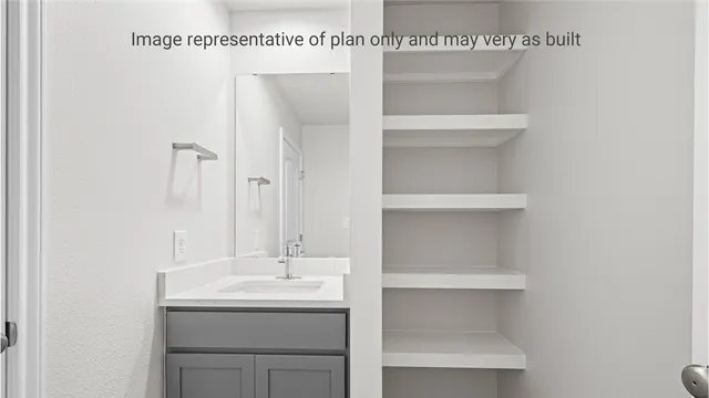 a bathroom with a bathtub a shower a sink and a mirror