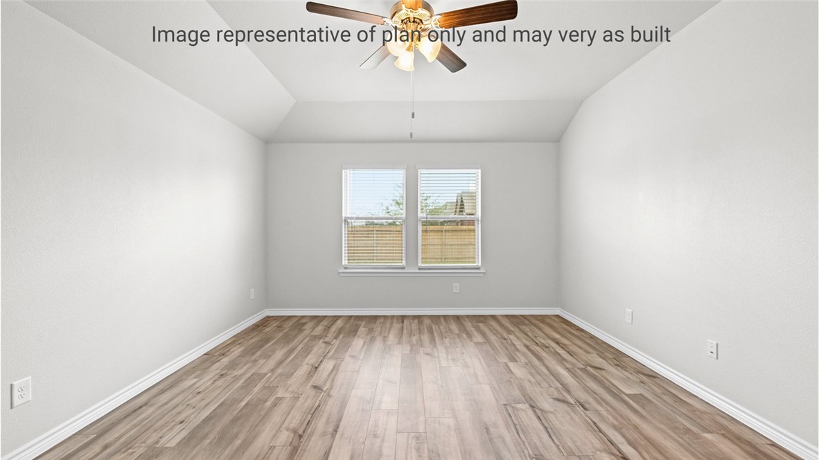 1409 Irigoyen Street Corpus Christi, TX 78415 - Photo 27 of 38 wooden floor in an empty room with a window