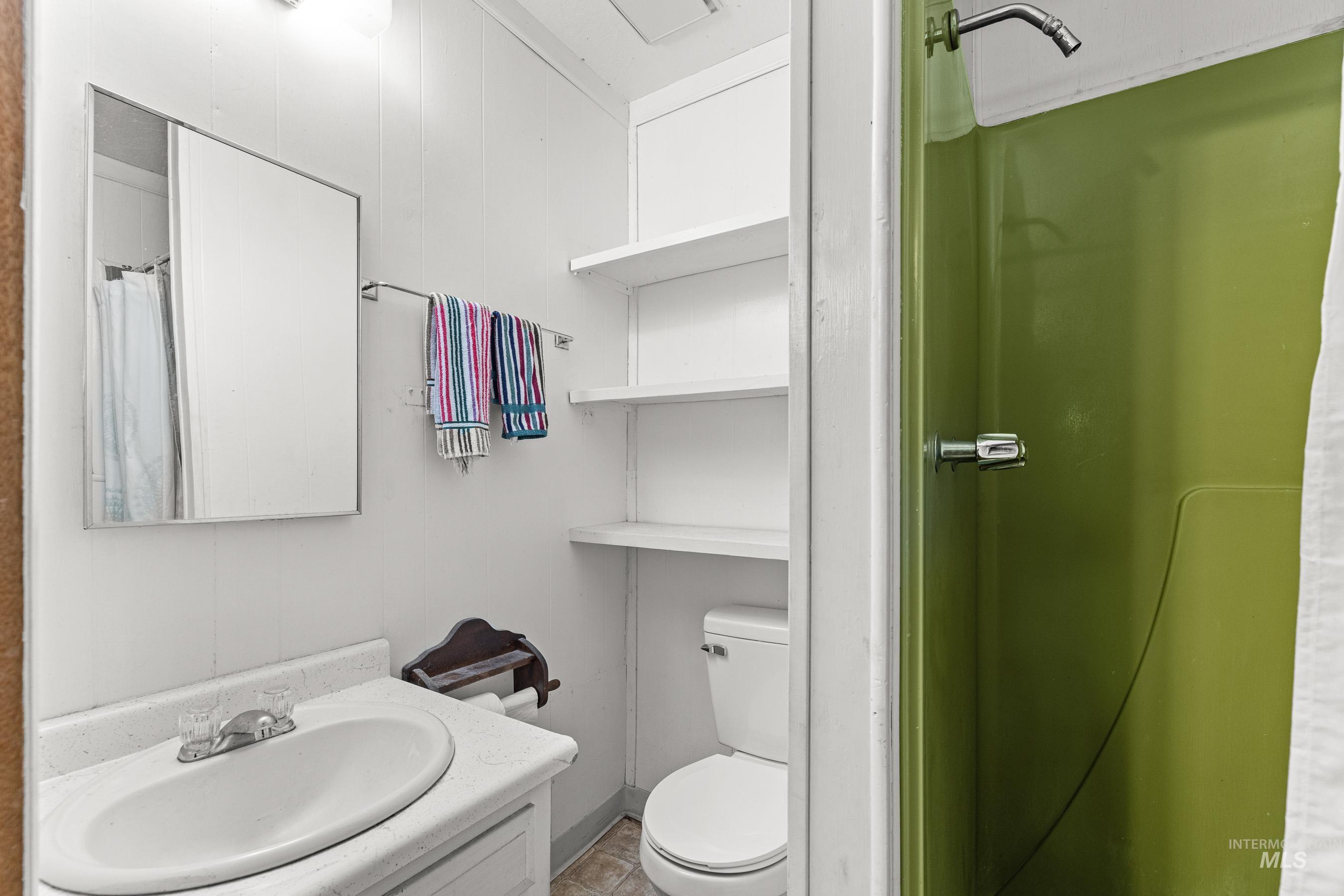 192 East Shingle Creek Road Riggins, ID 83549 - Photo 36 of 50 Full bathroom featuring vanity and a shower with curtain