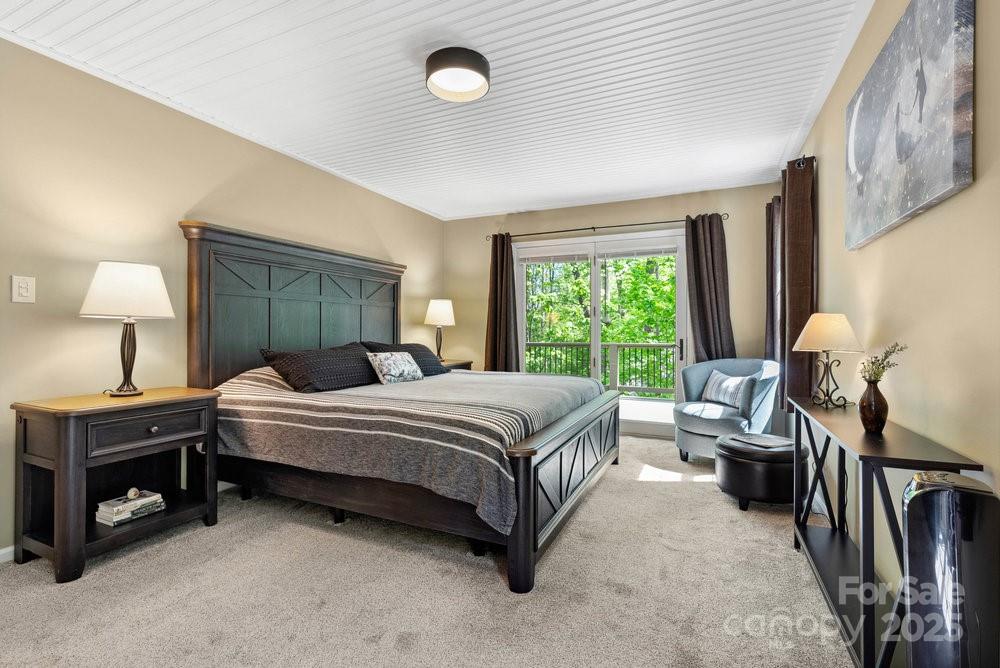 83 Lovers Loop Road Asheville, NC 28803 - Photo 20 of 44 a bedroom with a bed and a window