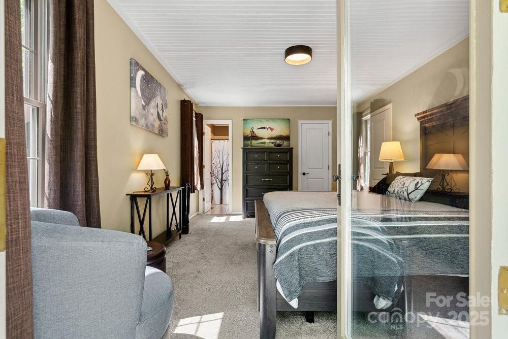 83 Lovers Loop Road Asheville, NC 28803 - Photo 24 of 44 a view of a livingroom with furniture and windows