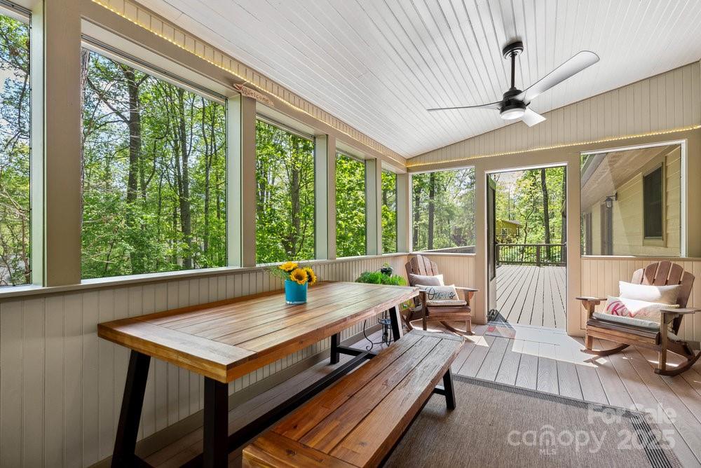 83 Lovers Loop Road Asheville, NC 28803 - Photo 27 of 44 a living room with furniture and a large window
