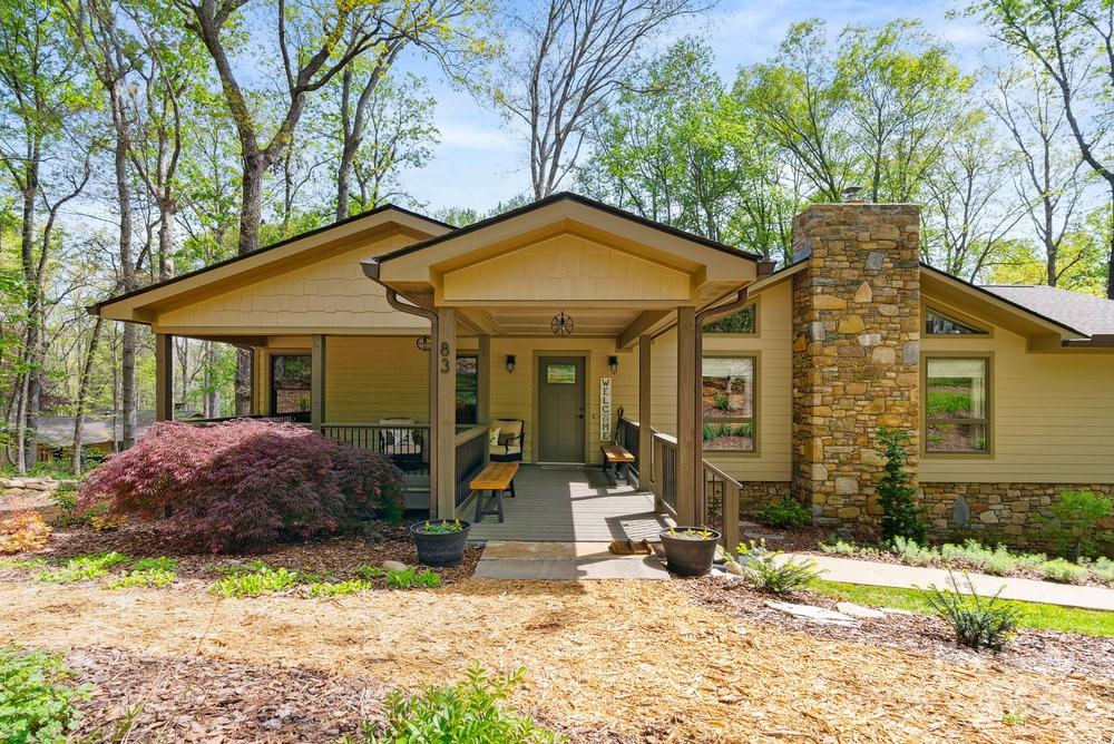 83 Lovers Loop Road Asheville, NC 28803 - Photo 3 of 44 a front view of a house with garden