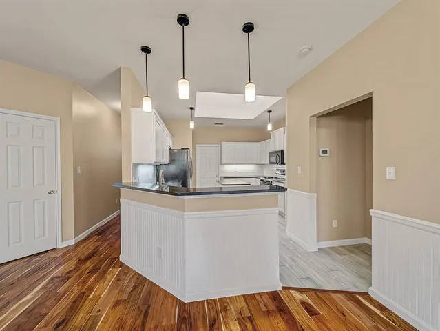 a very nice looking room with a wooden floor