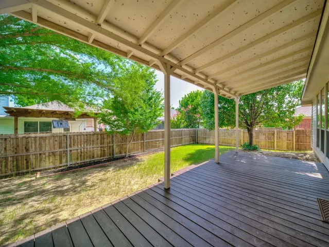a view of swimming pool with a backyard