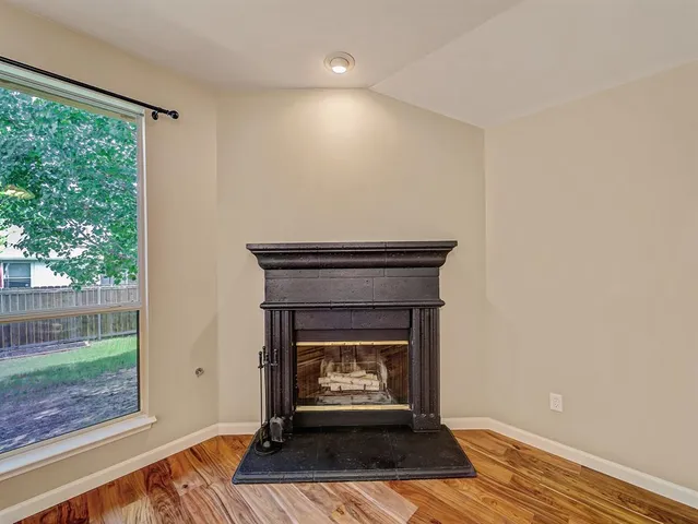 a living room with a fireplace