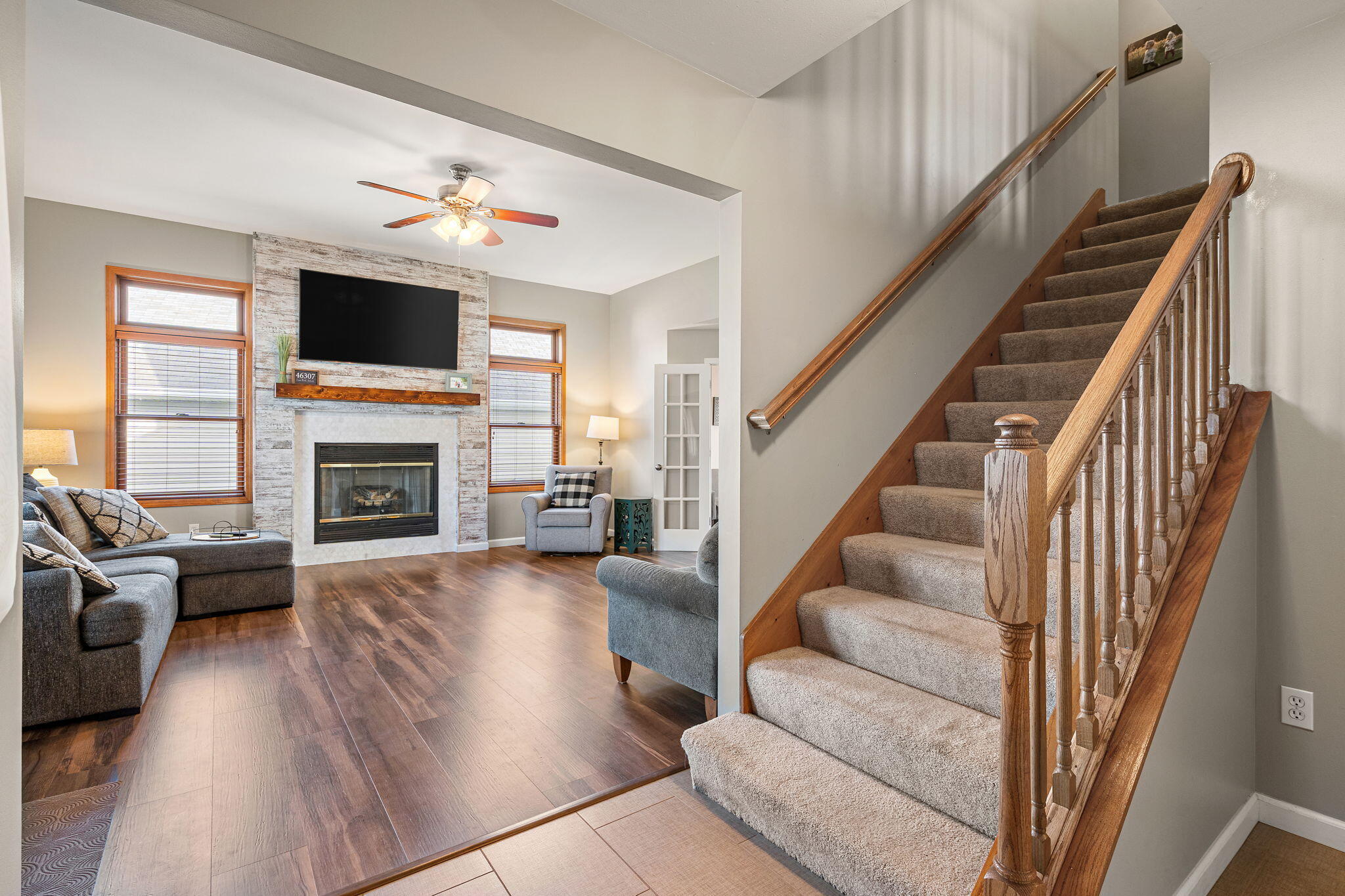 412 Chessington Drive Crown Point, IN 46307 - Photo 11 of 30 a living room with furniture fireplace and flat screen tv
