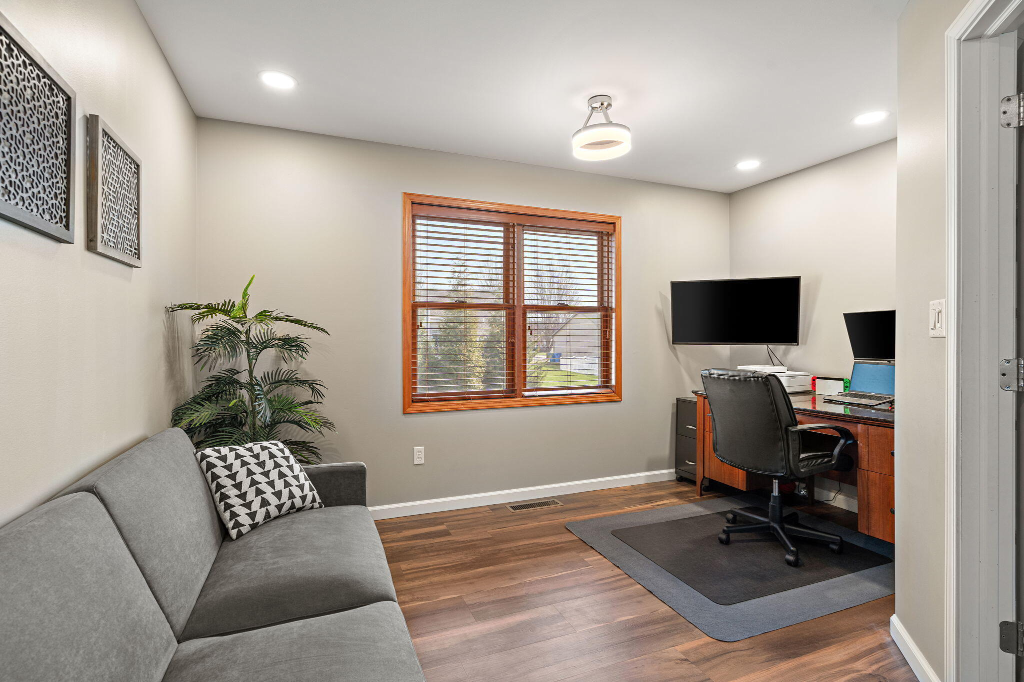 412 Chessington Drive Crown Point, IN 46307 - Photo 12 of 30 a living room with furniture and a flat screen tv