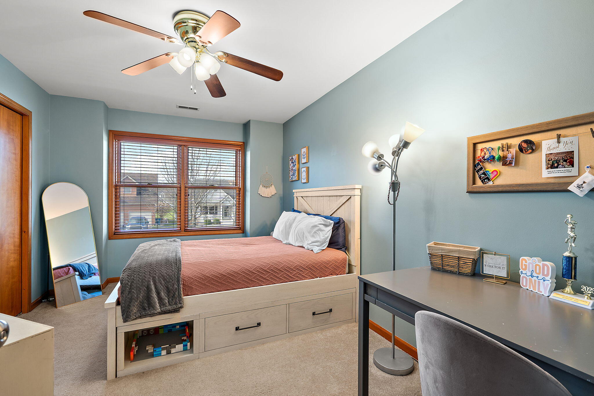 412 Chessington Drive Crown Point, IN 46307 - Photo 14 of 30 a bedroom with a bed and a large window