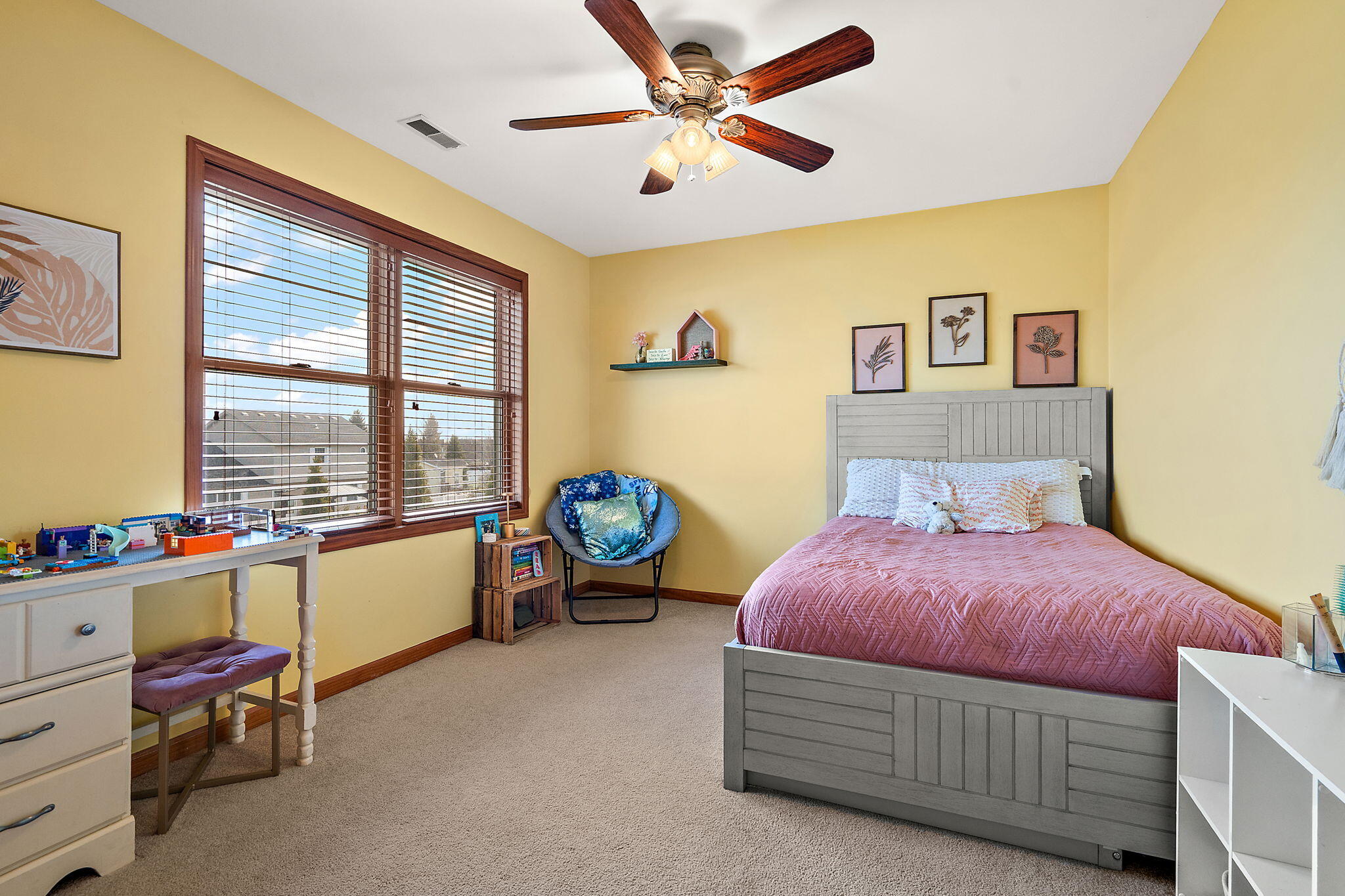 412 Chessington Drive Crown Point, IN 46307 - Photo 16 of 30 a bedroom with a bed and a chandelier