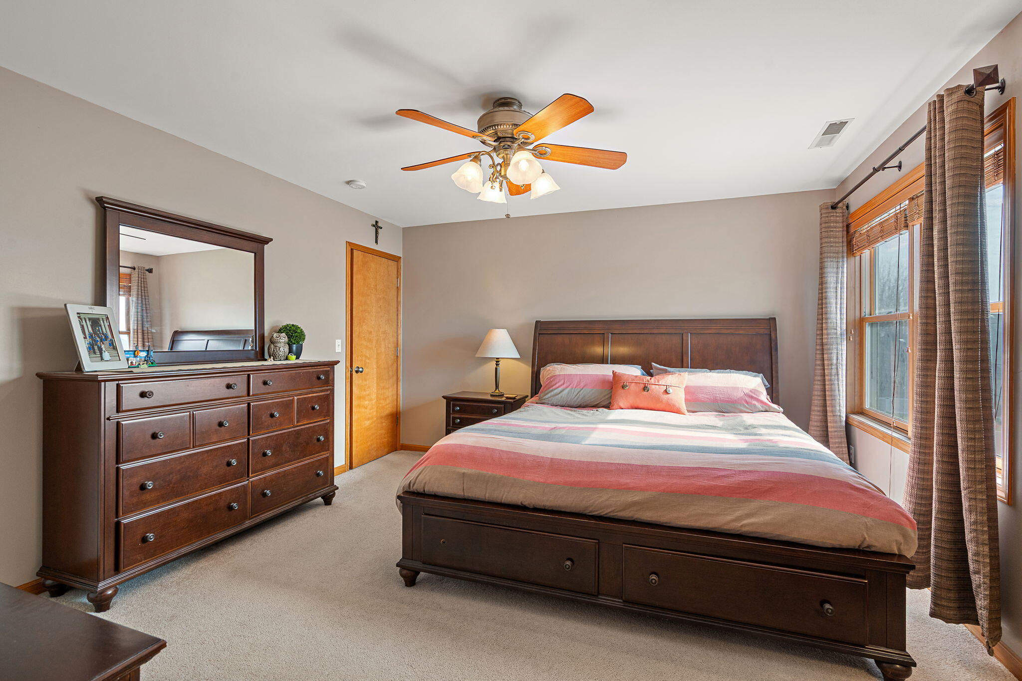 412 Chessington Drive Crown Point, IN 46307 - Photo 18 of 30 a bedroom with a bed and a dresser