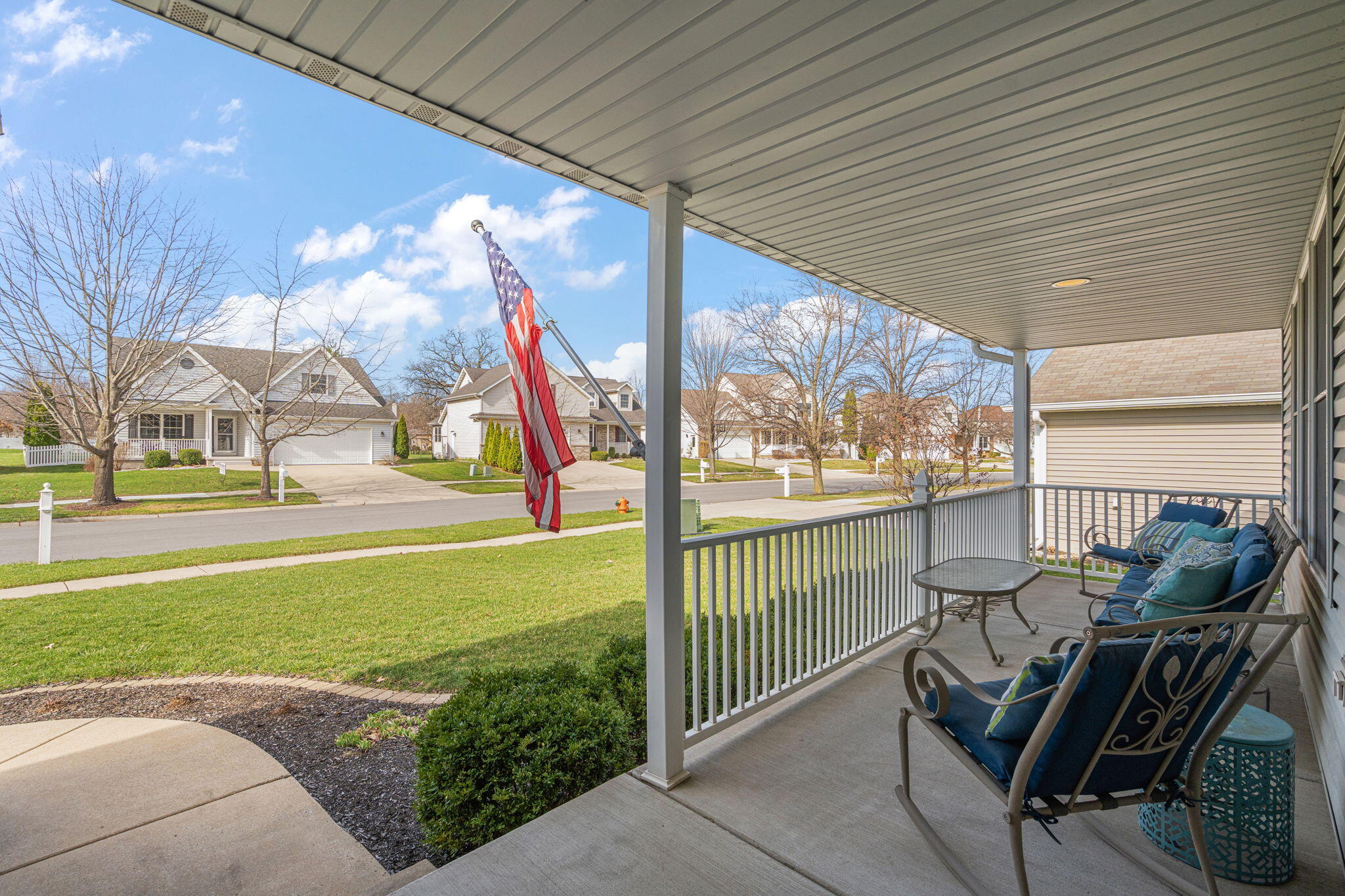 412 Chessington Drive Crown Point, IN 46307 - Photo 2 of 30 a view of a porch with furniture and garden