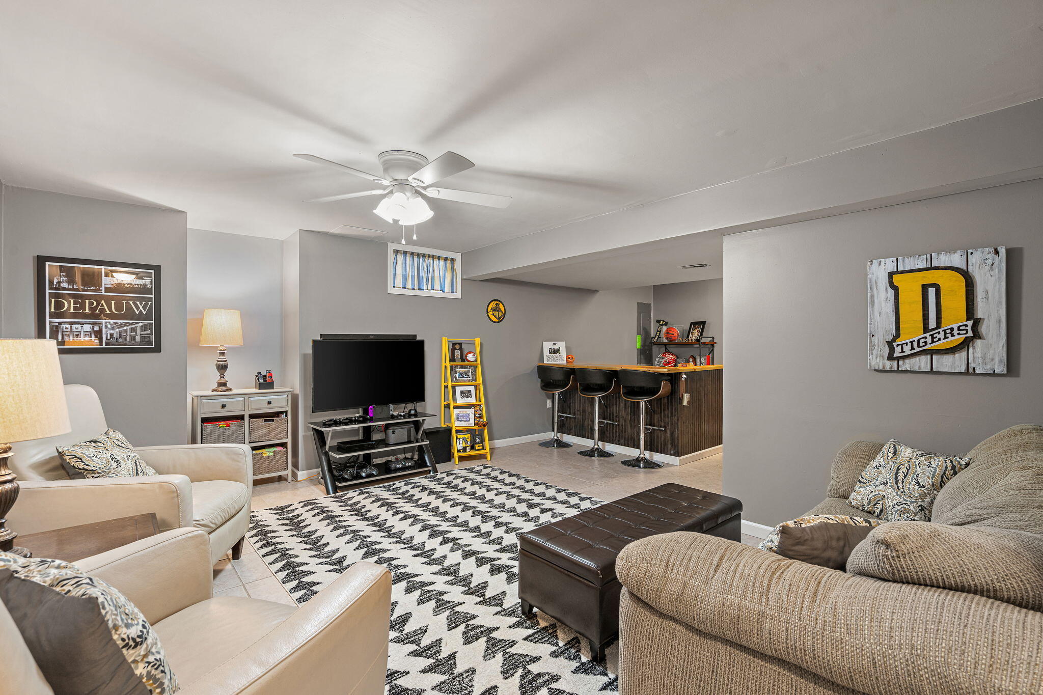 412 Chessington Drive Crown Point, IN 46307 - Photo 24 of 30 a living room with furniture and a flat screen tv