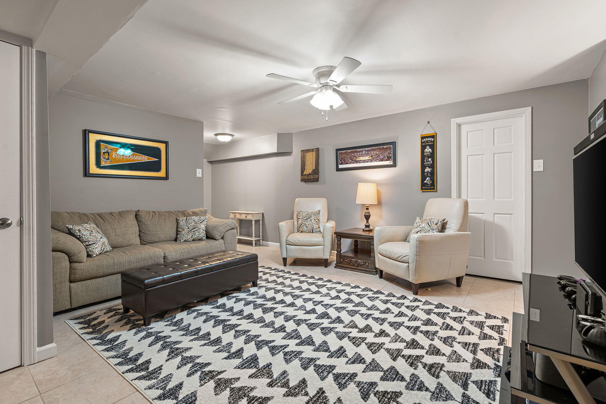 412 Chessington Drive Crown Point, IN 46307 - Photo 25 of 30 a living room with furniture and a flat screen tv