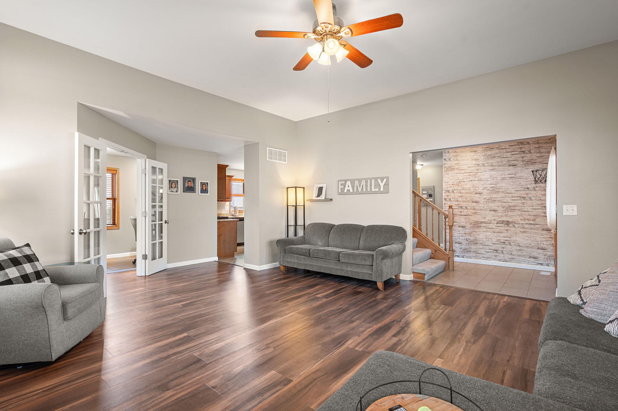 412 Chessington Drive Crown Point, IN 46307 - Photo 10 of 30 a living room with furniture and a wooden floor