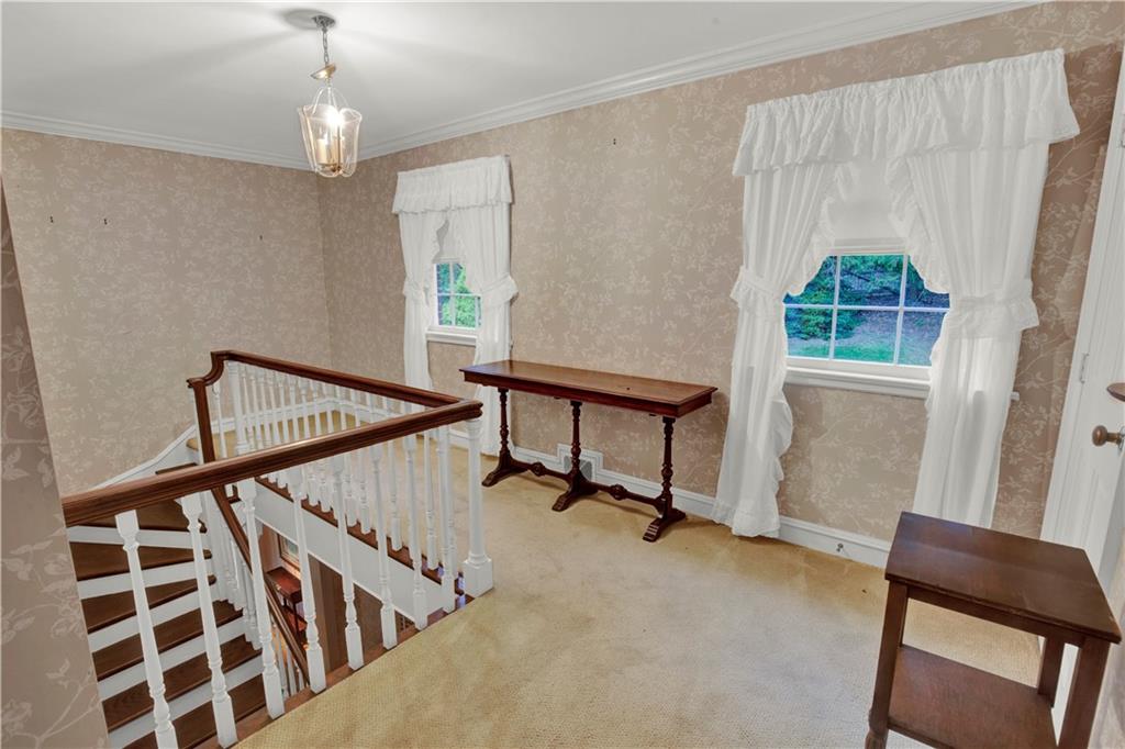 234 Baywood Road Ligonier, PA 15658 - Photo 29 of 48 Staircase leads to two en-suite bedrooms.