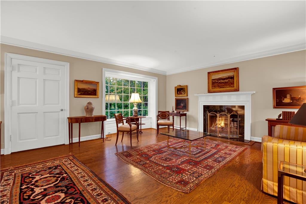 234 Baywood Road Ligonier, PA 15658 - Photo 8 of 48 Stunning living room features one of the six fireplaces.