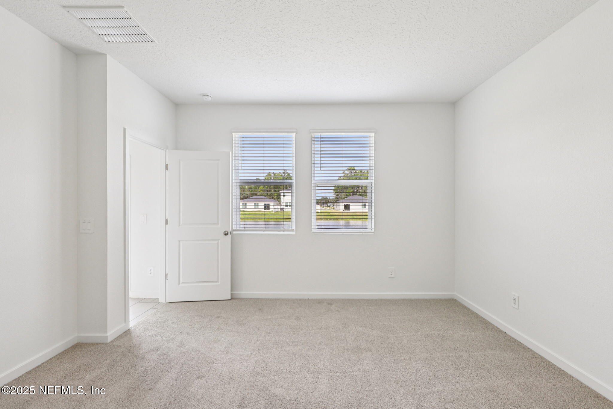 9638 Cypress Mdws Road Jacksonville, FL 32219 - Photo 19 of 35 a view of room and window