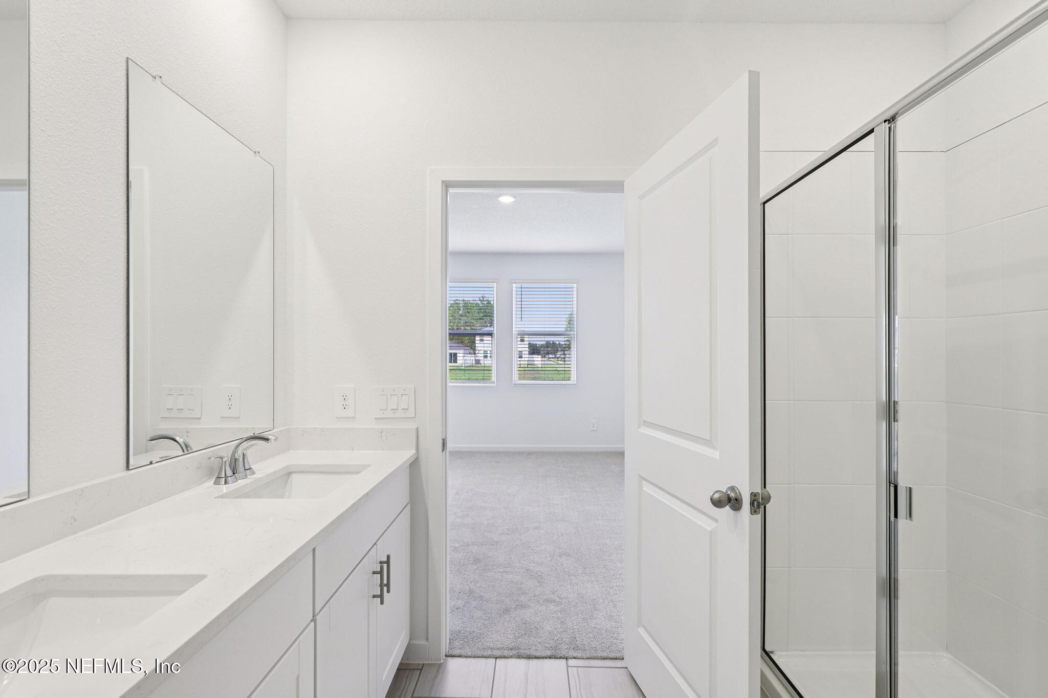 9638 Cypress Mdws Road Jacksonville, FL 32219 - Photo 23 of 35 a bathroom with a sink and a mirror