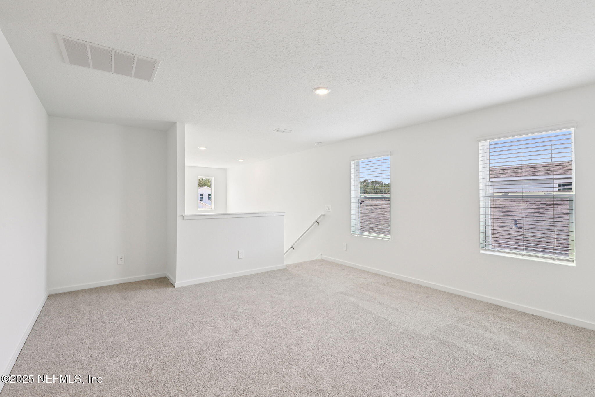 9638 Cypress Mdws Road Jacksonville, FL 32219 - Photo 26 of 35 an empty room with windows