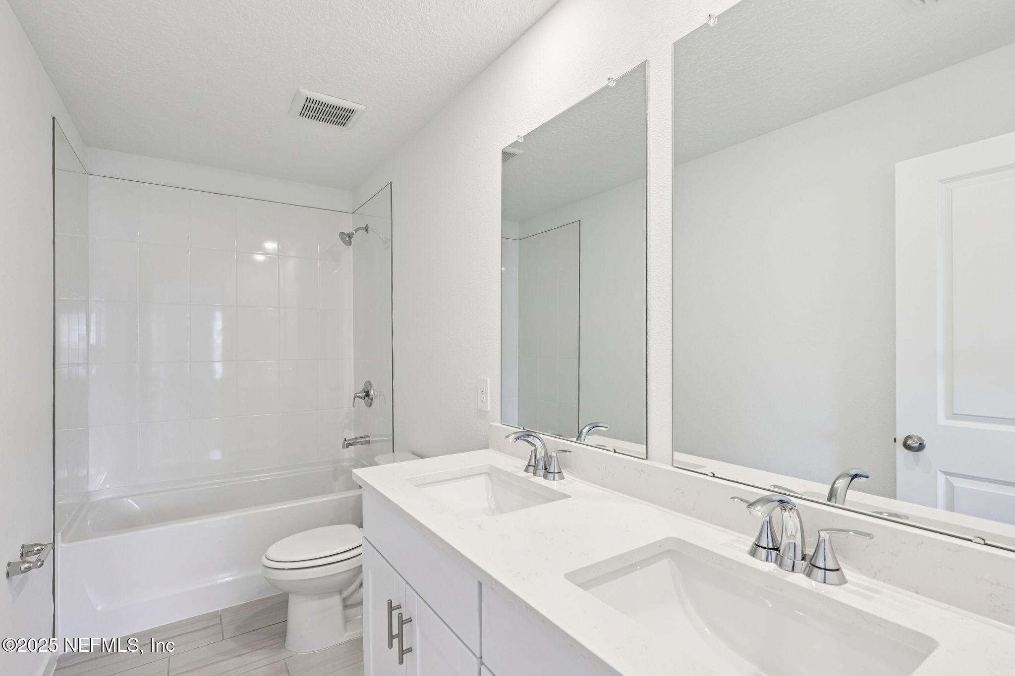 9638 Cypress Mdws Road Jacksonville, FL 32219 - Photo 30 of 35 a bathroom with a sink a toilet and shower