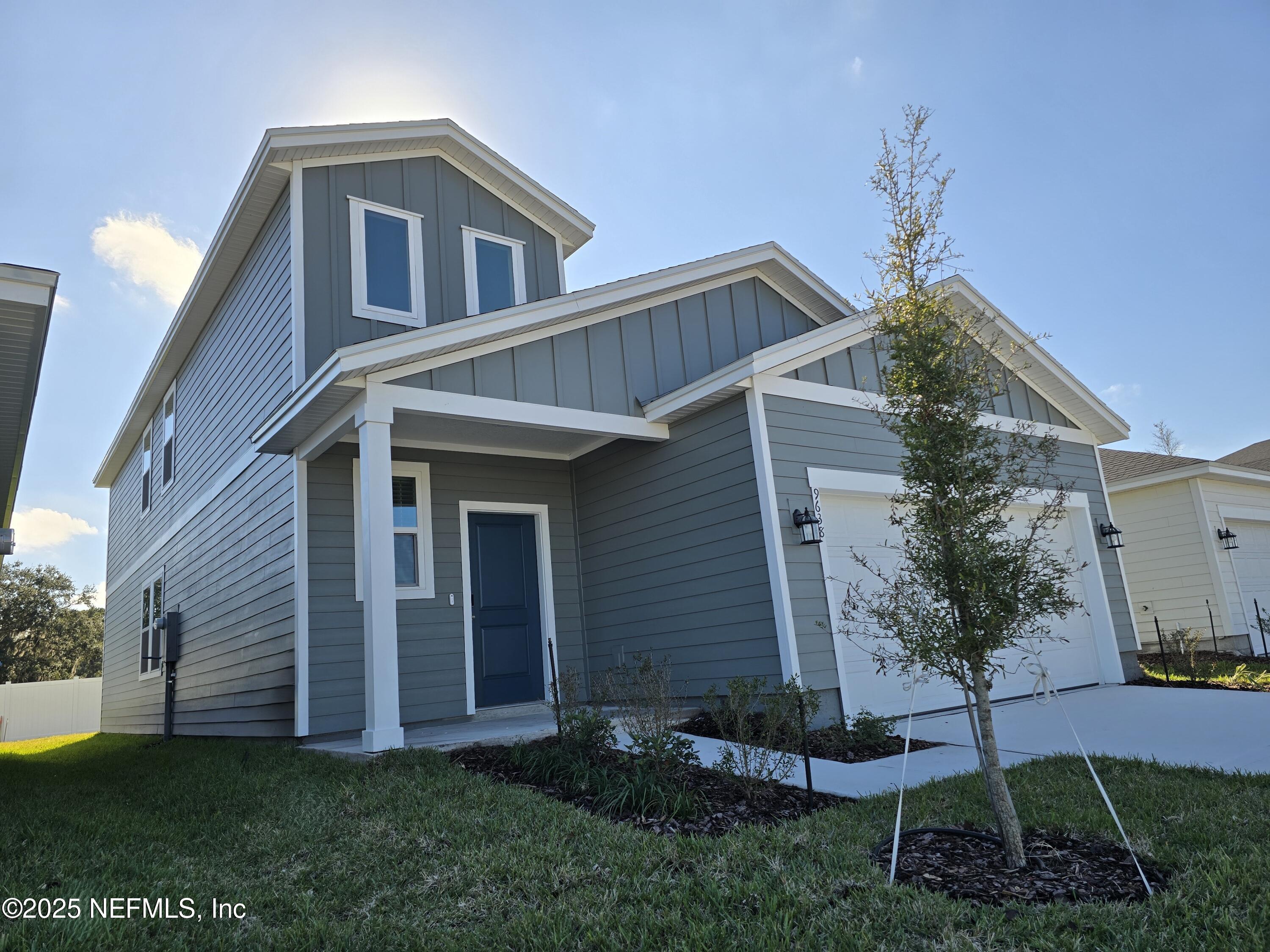 9638 Cypress Mdws Road Jacksonville, FL 32219 - Photo 33 of 35 a front view of a house with garden