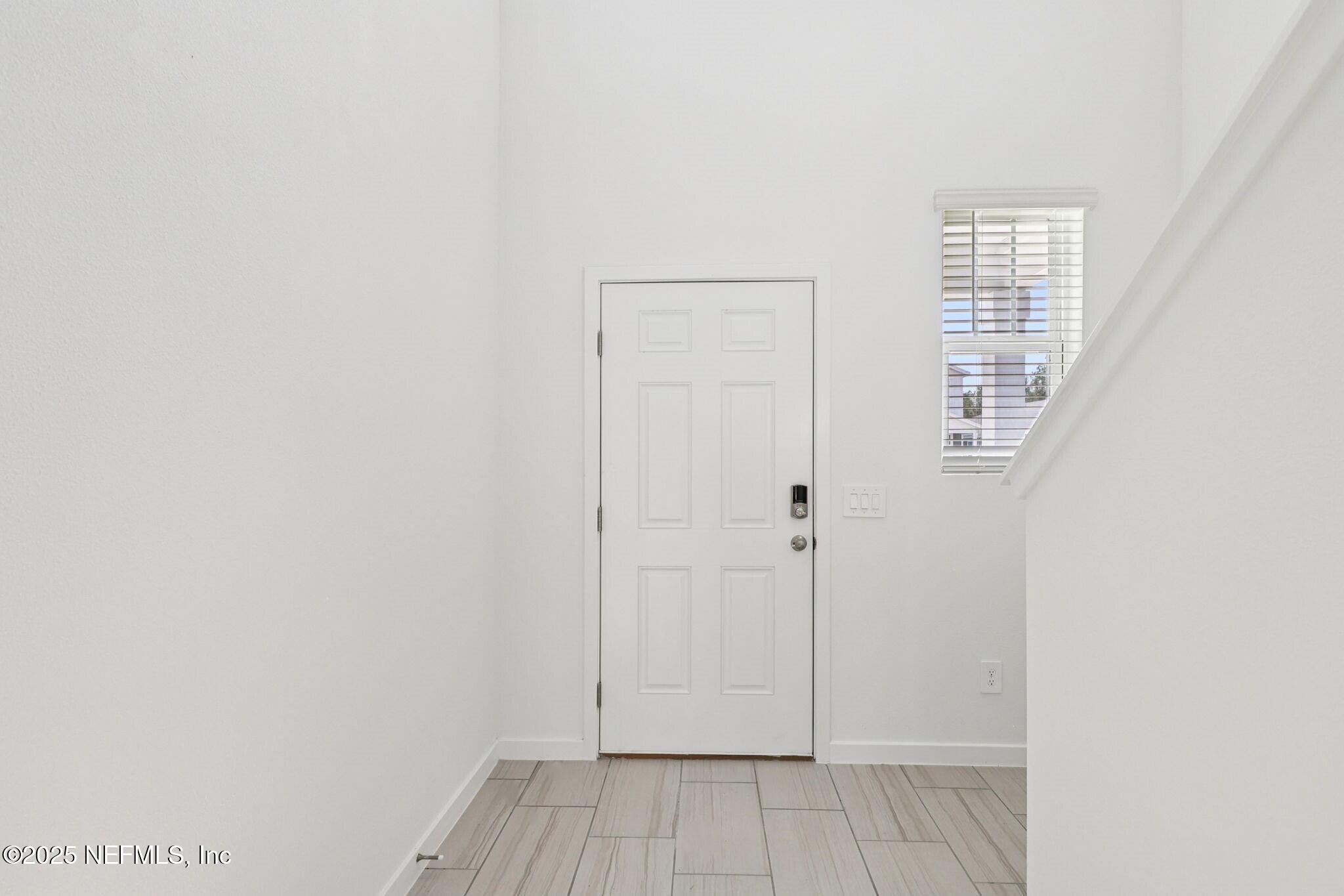 9638 Cypress Mdws Road Jacksonville, FL 32219 - Photo 10 of 35 a view of room with window