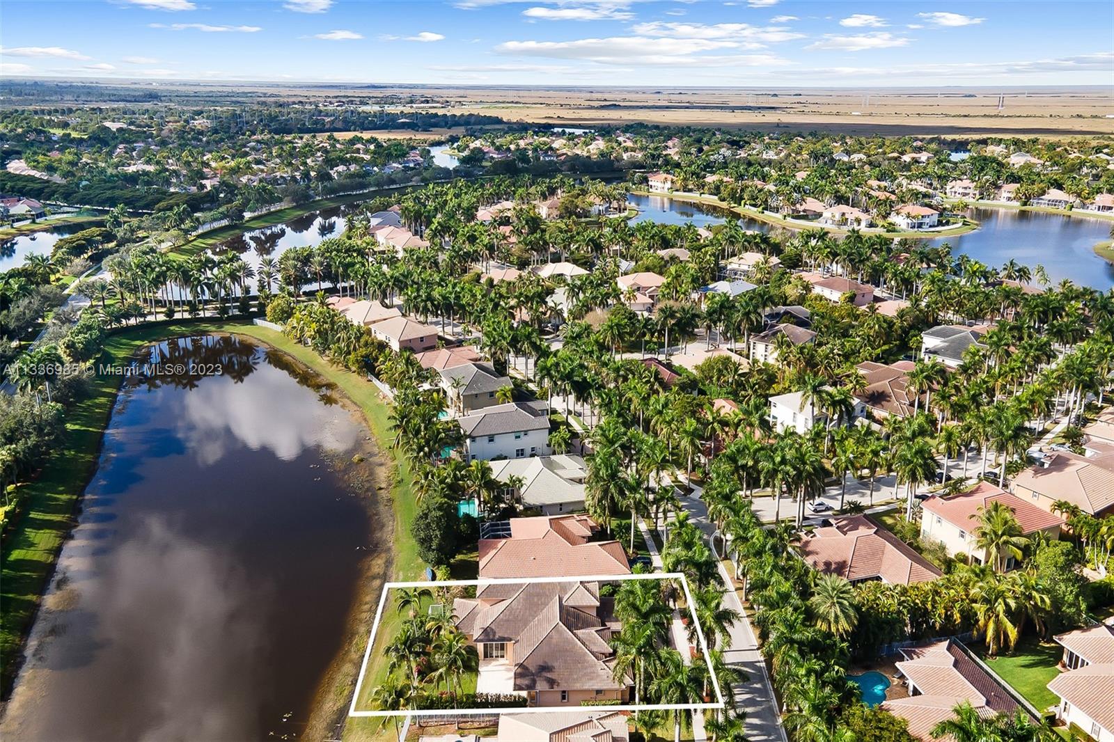 948 Windward Way Weston, FL 33327 - Photo 4 of 46 an aerial view of a city