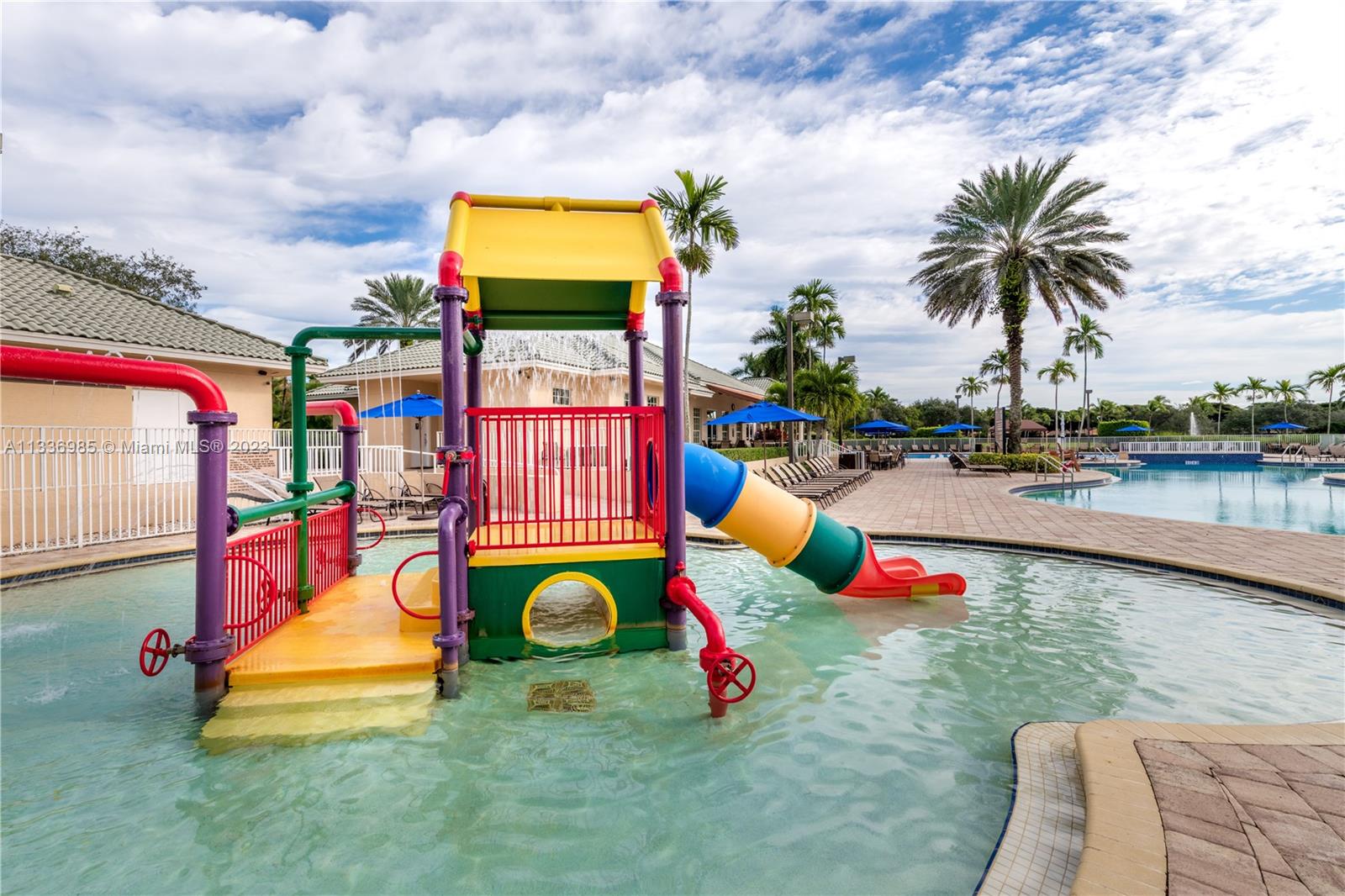 948 Windward Way Weston, FL 33327 - Photo 44 of 46 swimming pool with outdoor seating