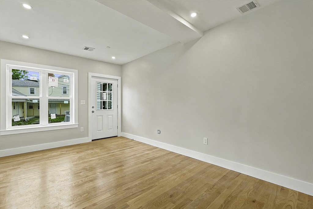 4 Mayhew Street Framingham, MA 01702 - Photo 21 of 42 an empty room with a window