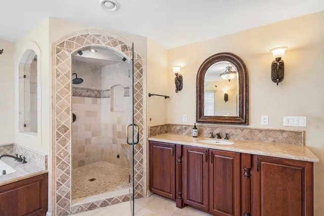 a view of a chairs and table in the patio
