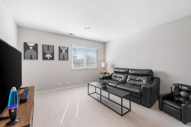 an aerial view of a house with a garden