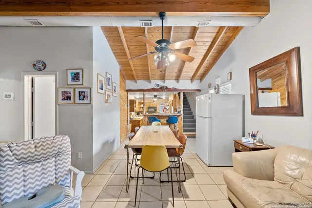 a living room with a couch and a table