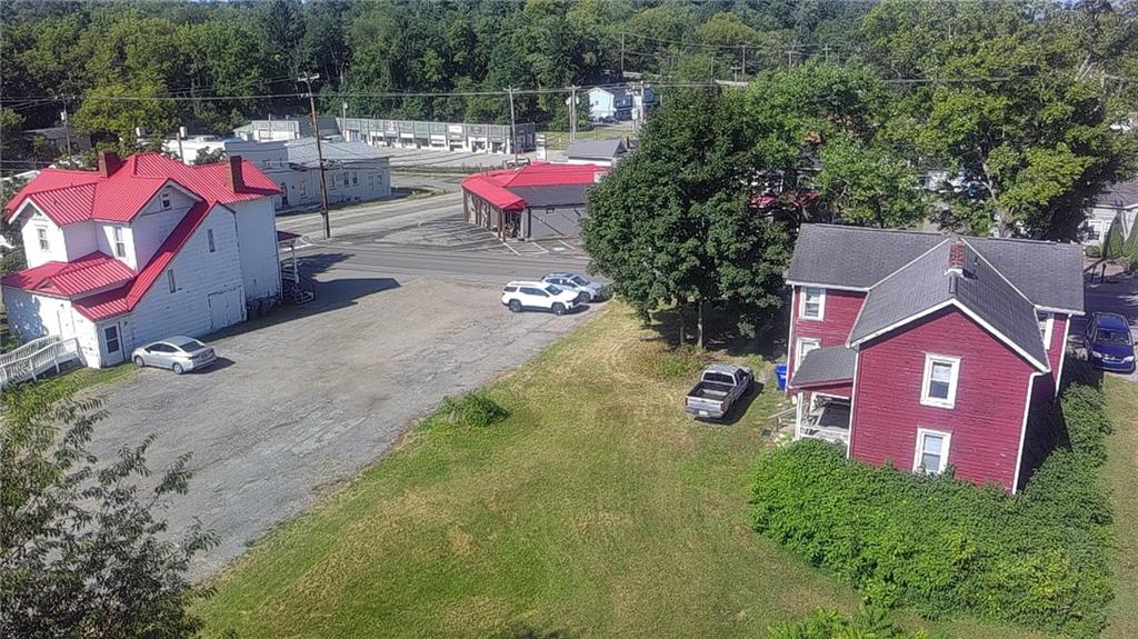 a view of swimming pool with sitting area