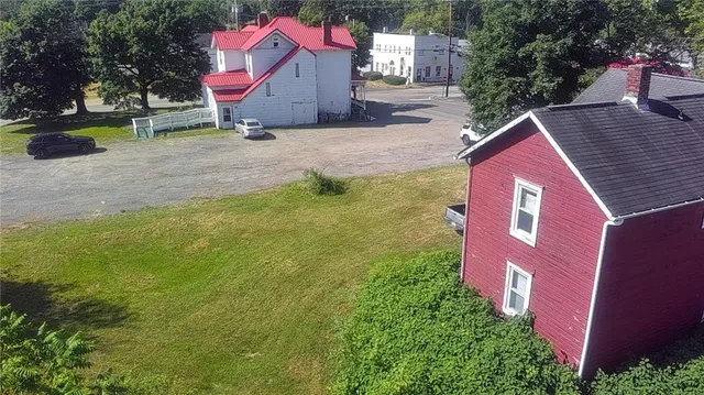 a front view of a house with yard